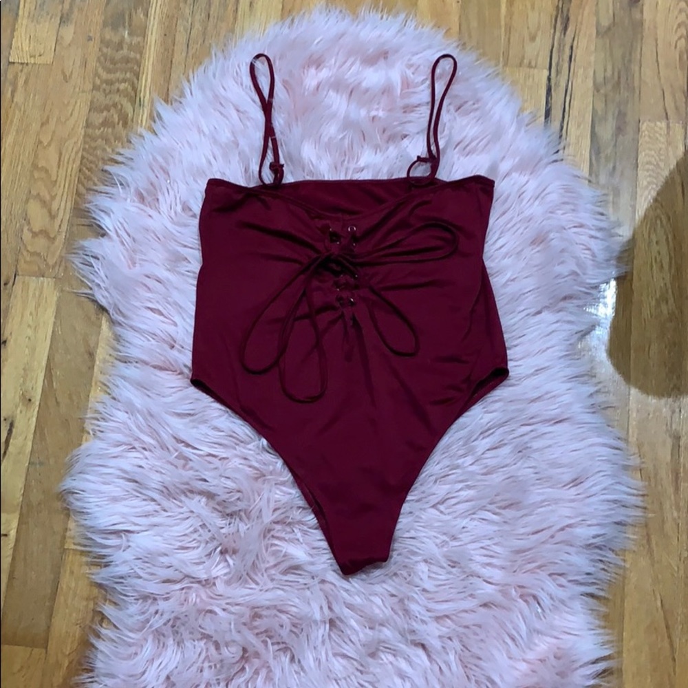 Burgundy body suit